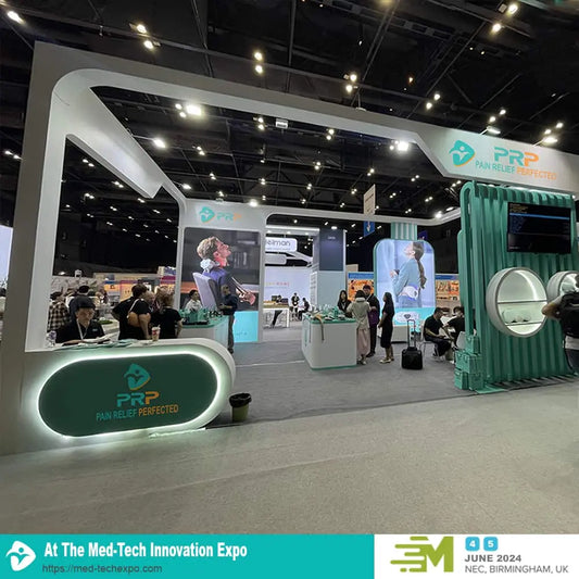 The vibrant PRP - Pain Relief Perfected booth, captured as a hub of activity at the Med-Tech Innovation Expo. The photo shows numerous attendees exploring the modern stand, speaking with company representatives, and viewing the latest products.