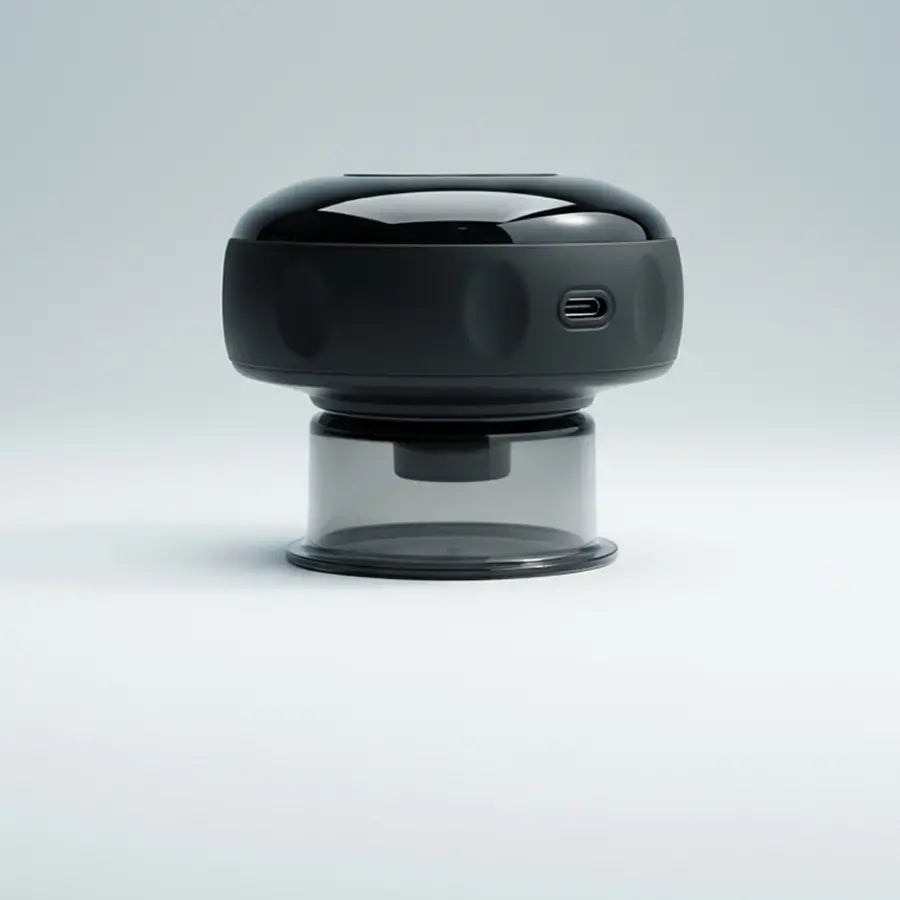 The PRP ThermCup smart cupping device in black, mushroom-shaped with a USB-C charging port, placed on a gray-white background, showcasing its compact, modern design and convenient connectivity.
