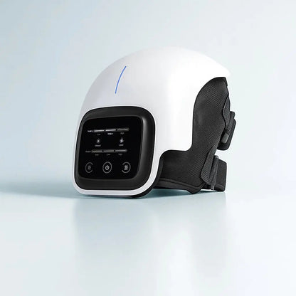 A close-up shot of a white and black knee massager device with a digital display, on a light blue background.