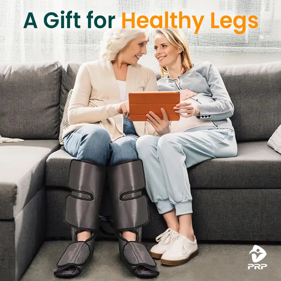 Elderly woman and daughter sitting on couch, using PRP® LegTech leg massager with air compression wraps, tagline A Gift for Healthy Legs.